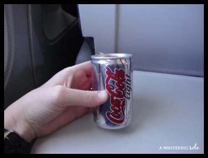 Small Diet Coke can on a plane
